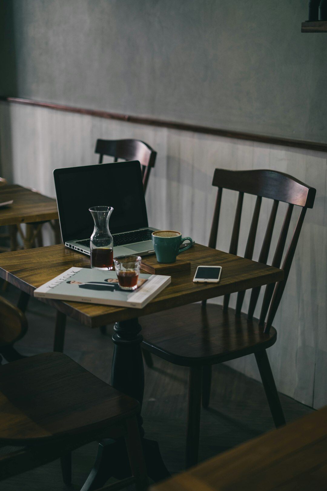 Small business meeting around a table with laptops